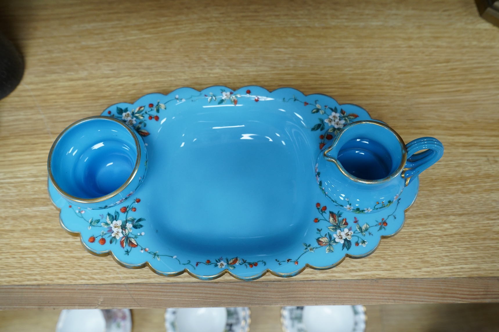 A 19th century opaline strawberry set, 30cm wide